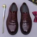 Men's handmade burgundy leather dress shoes in a classic lace-up oxford style - EU 38 / Coffee