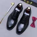 Classic black leather brogue shoes with wingtip detailing and dressy oxfords style - EU 37 / Black