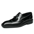 Classic black leather brogue loafers with decorative tassels and wingtip carvings - EU 38 / Black (Black Trim)