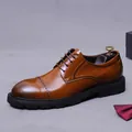 Brown leather Oxford dress shoe with classic brogue detailing and thick rubber sole - EU 37 / Yellow Brown