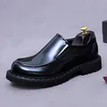 Glossy black leather platform loafers with thick lug soles for a modern classic look - EU 37 / Black