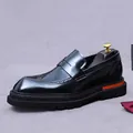 Men's black patent leather penny loafers with brogue detail and orange heel accent - EU 37 / Black