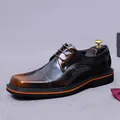 Deep brown burnished leather oxford shoe with classic brogue details and orange sole accents - EU 37 / Patina Brown