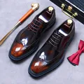 Men's brown leather Brogue shoes with hand-burnished finish and classic wingtip detailing - EU 37 / Brown