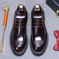 Detail of high-gloss dark brown leather Derby shoes with stitching and elegant accessories - EU 37 / Coffee