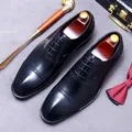 Classic black leather Oxford dress shoes with brogue carving for professional business attire - EU 37 / Black