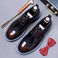 Classic dark brown brogue shoes with wingtip detailing and thick soles in luxury gift set - EU 37 / Brown