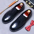 Polished black leather wingtip brogue shoes for men with classic oxford lacing style - EU 37 / Black