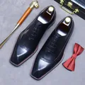 Classic black leather oxfords for men with elegant brogue carving and pointed toe detail - EU 37 / Black