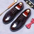 Polished dark brown leather derby shoes with brogue detailing and classic lacing - EU 37 / Coffee