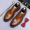 Men's dark brown leather brogue shoes with classic wingtip design and thick rubber soles - EU 37 / Brown