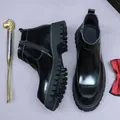Polished black leather Chelsea boots with thick lug soles and side zipper closure - EU 37 / Black