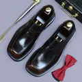 Polished dark brown leather loafers with wooden shoe trees in a classic British style - EU 37 / Brown