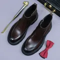 Deep brown leather men's Chelsea boots with metal zipper and chunky rubber soles - EU 38 / Coffee