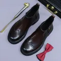 Deep brown leather brogue Chelsea boots for men with classic wingtip carving details - EU 38 / Coffee