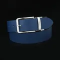 Detailed macro of a dark blue micro-perforated leather belt with a silver metal buckle - Standard Size / Blue