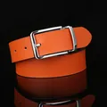 Casual men's orange perforated leather belt with a polished silver rotating pin buckle - Standard Size / Orange