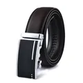 Detail view of men's leather belt showing lychee grain texture and silver automatic buckle - 110cm / Style 208 Silver Buckle Brown