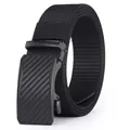 Detail view of nylon belt with automatic carbon fiber texture buckle and woven texture - Black Buckle Black / 105