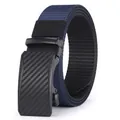 Detailed macro view of navy blue nylon woven belt with black carbon fiber automatic buckle - Black Buckle Blue Black