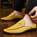 Men's yellow leather loafers with breathable cutout design and silver buckle detail - EU 40 / Yellow
