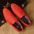 Men's slip-on loafers in vibrant red knit fabric with classic wood grain background - EU 38 / Red
