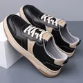 Lässige Herren-Sneaker aus schwarzem und beige Leder-Mix mit modischem Logo-Detail - EU 38 / Schwarz
