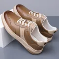 Herren Freizeit-Sneaker aus Leder in Dunkelbraun und Beige mit stilvollem Mode-Logo - EU 38 / Braun