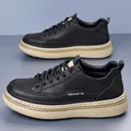 Men's low-top black leather casual shoes featuring a thick beige non-slip sole and side logo - EU 38 / Black