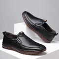Men's black slip-on leather loafers with brown anti-slip sole and orange stripe accents - EU 38 / Black