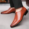 Polished brown pointed-toe leather business shoes for men with side metal rivet accents - EU 38 / Brown