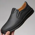 Men's black slip-on loafers with embossed leather texture and soft non-slip rubber soles - Embossed Stitched Style / Black