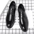 Polished black leather formal dress shoes for men with classic brogue punch detailing - EU 38 / Black Flat