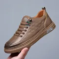 Baskets en cuir marron pour hommes avec texture géométrique et ruban rayé emblématique - EU 38 / Marron