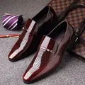 Men's pointed-toe burgundy leather loafers with brogue details and metallic buckle - EU 38 / Hollow Brown