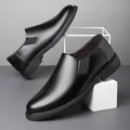Classic black leather slip-on loafers for men with soft rubber soles and elastic side panels - EU 38 / Black