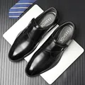 Formal black leather monk strap shoe with single buckle and perforated side details - EU 38 / Black