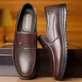 Business casual dark brown pebbled leather loafers for men with silver metal buckle detail - EU 38 / Flats / Brown