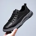 Men's retro casual sneakers in black leather finish with checkered embossed detailing - EU 39 / Black