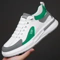 Witte platform sneakers voor heren met groene en grijze contrasterende details - EU 38 / Wit