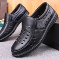 Men's black slip-on leather shoes with breathable perforated texture and metal logo - EU 38 / Hollow Out / Black
