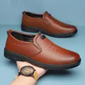 Brown leather slip-on loafers for men with textured finish and durable rubber soles - EU 38 / Brown
