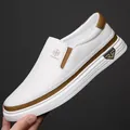White casual leather slip-on loafers for men with brown heel accents and thick white sole - EU 38 / White Unlined