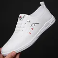 White casual leather loafers for men with red and black XINTAI embroidery and soft sole - 38 / Flats / White