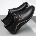 Classic black casual leather loafers with breathable texture and slip-resistant rubber sole - EU 38 / Black