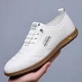 White minimalist slip-on loafers for men with brown rubber sole and printed details - EU 38 / White Unlined