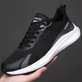 Men's breathable mesh running shoes in black and white with sport knit texture - EU 39 / Black