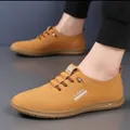 Mocassini casual da uomo color cammello con cuciture a onda e suola morbida, vista laterale - 38 / Giallo