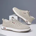 Men's casual beige leather sneakers with textured Z patterns and colorful sole stripes - EU 38 / Off White