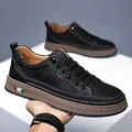 Men's casual black pebble grain leather sneakers with thick brown rubber sole and laces - EU 38 / Black